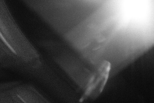 Dynamic light rays creating abstract shadow and smoky haze overlay effect with transparent background