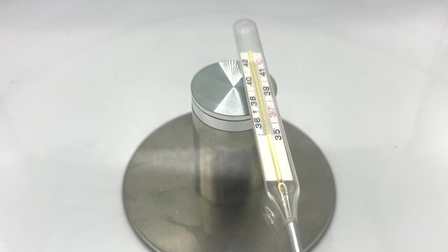 A glass thermometer shows temperature readings. Learn how to properly use it for measuring liquid temperatures in different settings