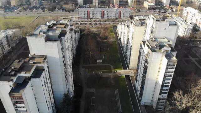 Aerial view flying over brutalist concrete rooftops in New Belgrade, Serbia.
