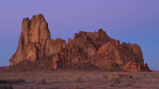 This prominent landmark is known as Church Rock, located in northeastern Arizona.