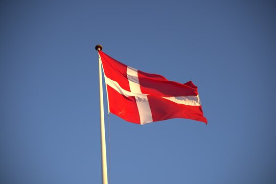 Close‑up of Danish Dannebrog flag in natural light