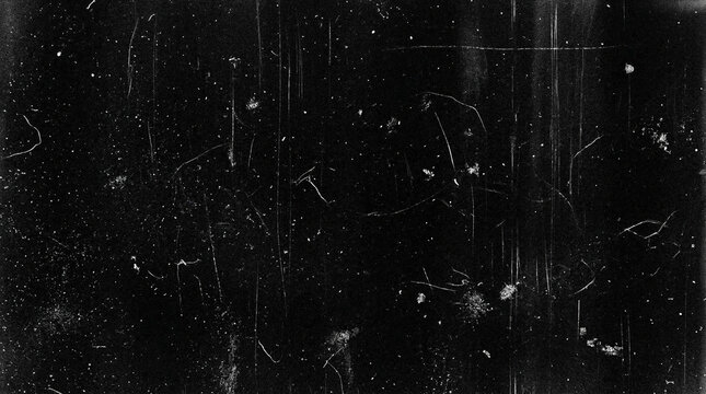 Pure black grunge texture with white dust particles scratches and film grain for dark overlay background