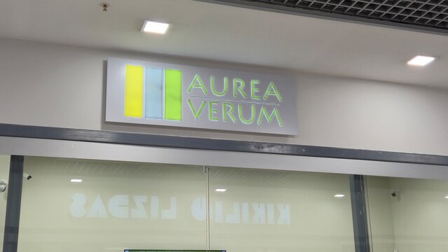 Vilnius Lithuania 16.04.2026 Aurea Verum illuminated store sign inside modern shopping mall interior luxury retail and commercial branding concept