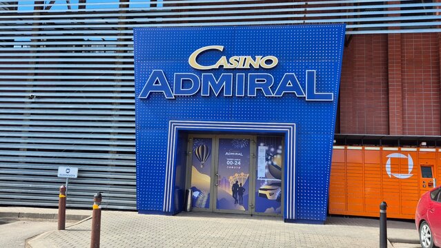 Vilnius Lithuania 18.04.2026 Casino Admiral gambling venue entrance with blue illuminated facade and modern urban entertainment architecture concept