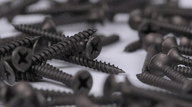 Metal mounting screws close-up. Macro image.