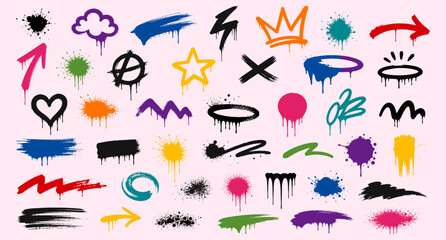 Fototapeta premium Urban graffiti spray paint icon collection with grunge splatter arrows, street art tags, drip symbols, brush strokes, spray texture elements and hip hop vector illustration