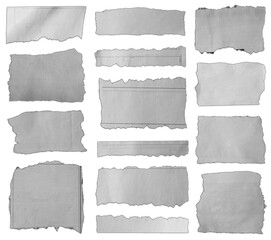 Fototapeta premium Torn pieces of paper on white