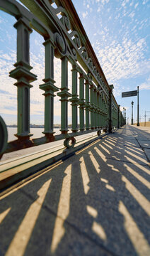 antique wrought iron railings of the Trinity Bridge, Troitsky Bridge on a spring morning