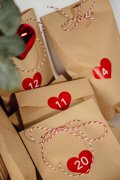christmas advent calendar craft bags near christmas tree.winter traditions