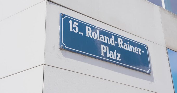 Street Sign at Wiener Stadthalle Venue &ndash; Roland Rainer Platz in Vienna&rsquo;s 15th District