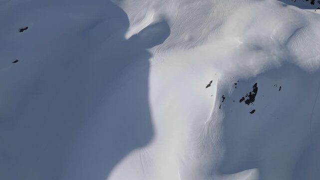 Breathtaking Aerial View of Snow-Covered Mountain Slopes in British Columbia, Canada