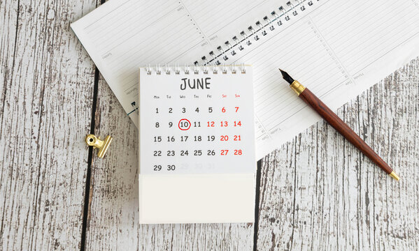 Wooden perpetual calendar showing the 10th of June