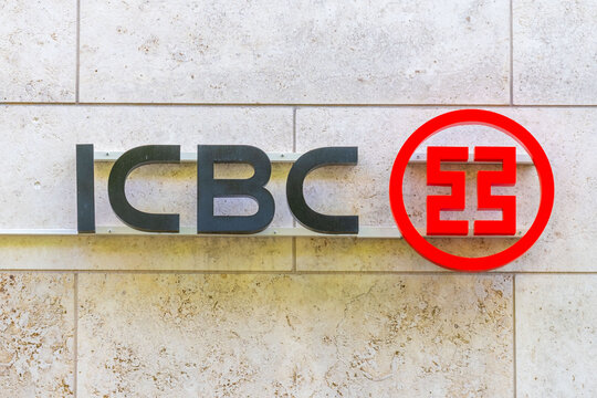 ICBC black letters red circular logo, Industrial and Commercial Bank China signage financial institution, exterior corporate branding banking services, global european money finance FRANKFURT, GERMANY