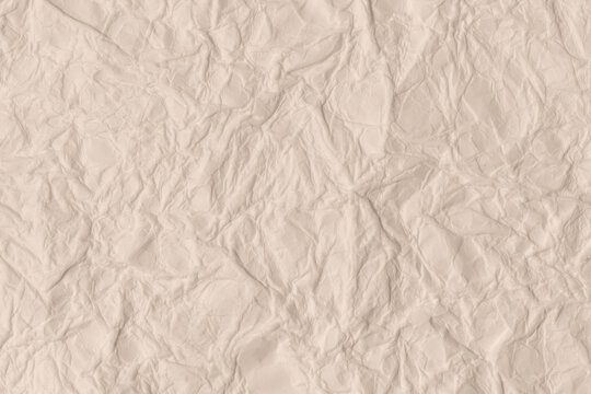 Minimalist high-quality macro of crumpled ivory paper with delicate creases and neutral shadows