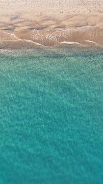 Clean and transparent blue water of the Sicilian sea near the beach