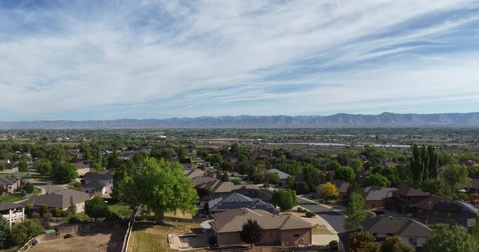 Aerial ascending over Redlands neighborhood in Grand Junction Colorado in spring