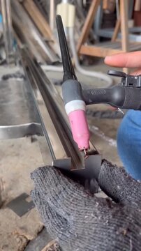 High precision TIG argon welding on stainless steel glass railing post 4K