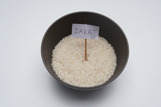 visualizing the concept of zakat through a simple yet powerful bowl of rice. perfect for illustrating themes of ramadhan and idul fitr