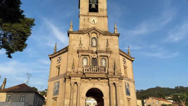 Negrelos, Santo Tirso, Portugal, April 18, 2026: TILT SLOW - The Parish Church of S. Tome de Negrelos.The church is notable for its 16th-century loggia, an architectural feature unique to the region. 