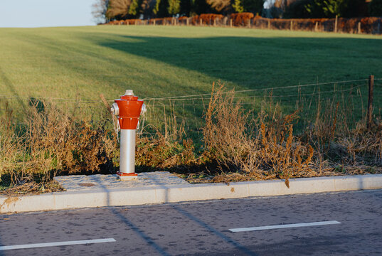 Atmospheric beautiful view of above-ground fire hydrant installed in rural area.