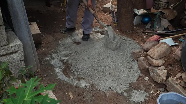 Close up of a fresh cement and sand mixture on the ground