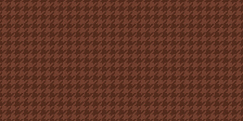 Fototapeta premium Subtle terracotta houndstooth pattern, perfect for backgrounds, textures, or fashion designs. This classic textile design offers a sophisticated and timeless aesthetic.