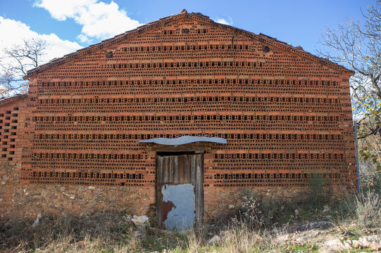 Tobacco drying house outdoors, building dedicated to the drying of tobacco leaves