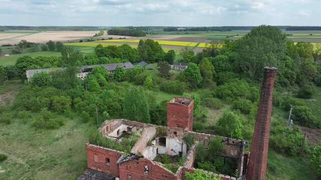 Aerial ruins communist state farm Poland overhead 3. Soviet State Agricultural Farm or State-Owned Farm. Collective agriculture employment and housing. Fall of Russia communism socialism farming.