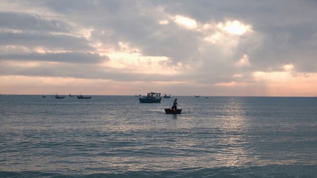 Fishermen Bringing Home The Daily Catch