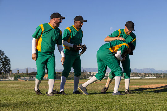 Baseball team supporting bent player after play, animated stats rising from glove showing impact