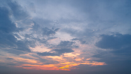 Fototapeta premium 4k Aerial of Cloud with sunset sky background in Thailand,Cloudscape time lapse background Dark red purple sunset sky Nature background, sunset in the clouds 