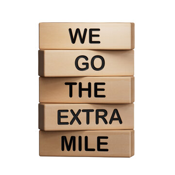 We go the extra mile symbol. Wooden blocks with words We go the extra mile.Business and We go the extra mile concept.Supports PNG files with transparent backgrounds.