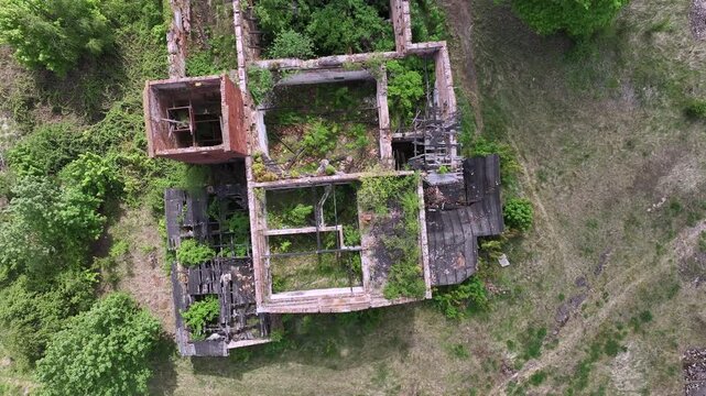 Aerial ruins communist state farm Poland climb 2. Soviet State Agricultural Farm or State-Owned Farm. Collective agriculture employment and housing. Fall of Russia communism socialism farming.