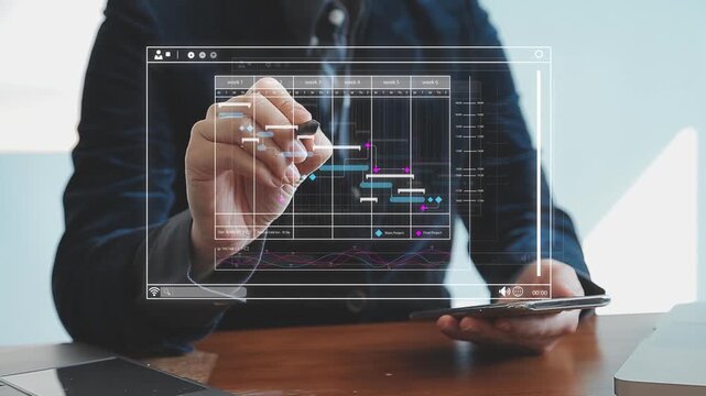 Project manager working with Gantt chart schedule to plan tasks and deliverables. Scheduling activities with a planning software, Corporate strategy for finance, operations, sales, marketing.