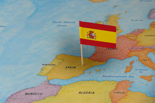 Spain flag pin marking Spain on Europe map, travel destination concept