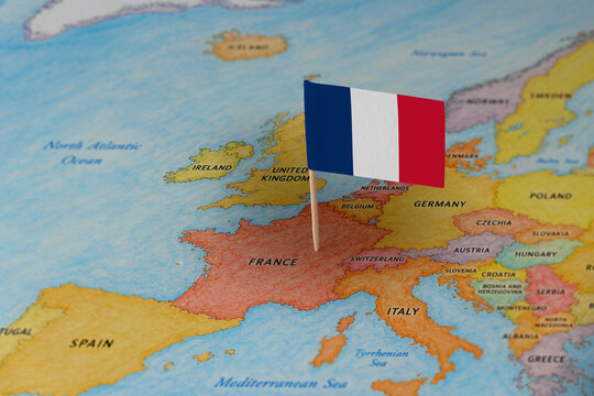 France flag pin marking France on Europe map, travel destination concept