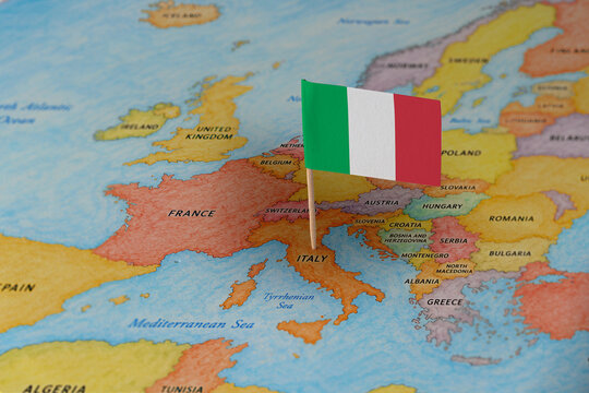 Italy flag pin marking Italy on Europe map, travel destination concept