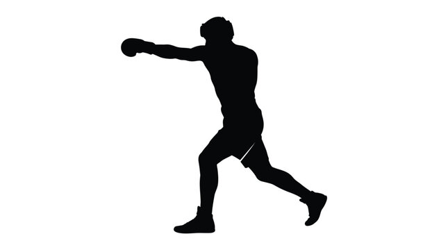 Professional boxer throwing a powerful jab in this high contrast silhouette photo showing athletic form and dynamic movement during a focused training session for competitive sports