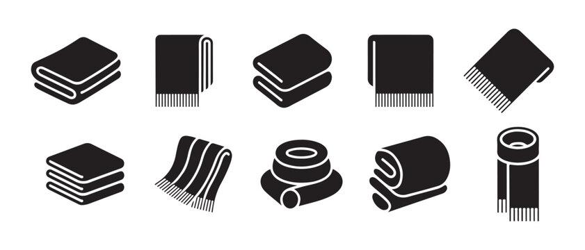 Black towel icons collection. featuring folded, rolled, and stacked linens on white background.