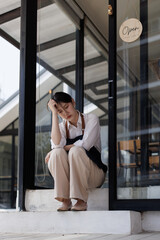 Fototapeta premium Small business owner experiencing stress and economic hardship