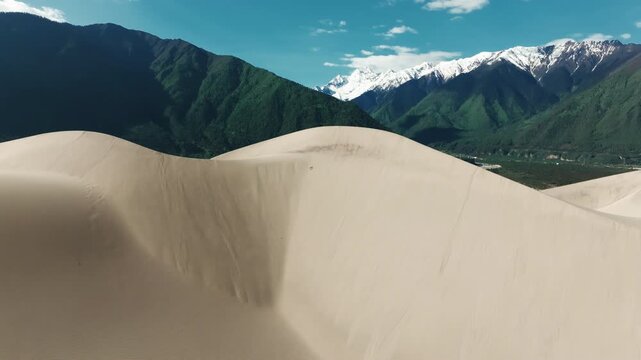 Aerial view of deserts and snow-capped mountains, Xizang