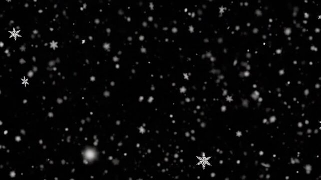 White snowflakes falling gently against a dark black background