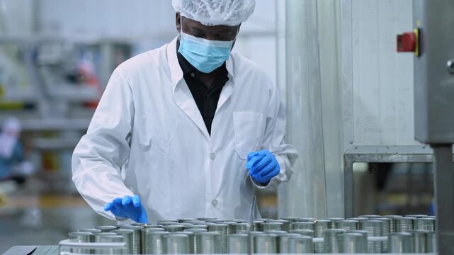 Manufacturing process in food industry factory setting industrial photography clean environment close-up view quality control