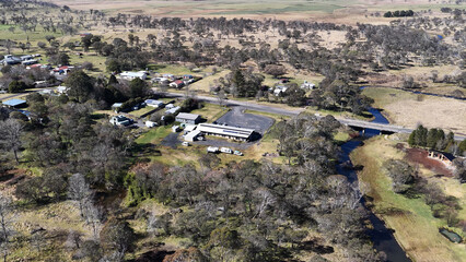 Obraz premium Aerial View of a Small Rural Town and Creek in New South Wales