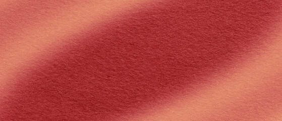 Red and orange gradient felt fabric texture background. Soft wool textile material with diagonal light effect for wallpaper or craft design. © Charlie Waradee