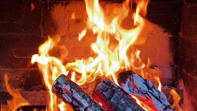 fire in fireplace wood burner ambience close up 