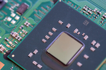 Fototapeta premium Abstract, Close up at electronic circuits, we see the technology of the mainboard, which is the important background of the computer. Electronic computer hardware technology,Motherboard digital chip. 