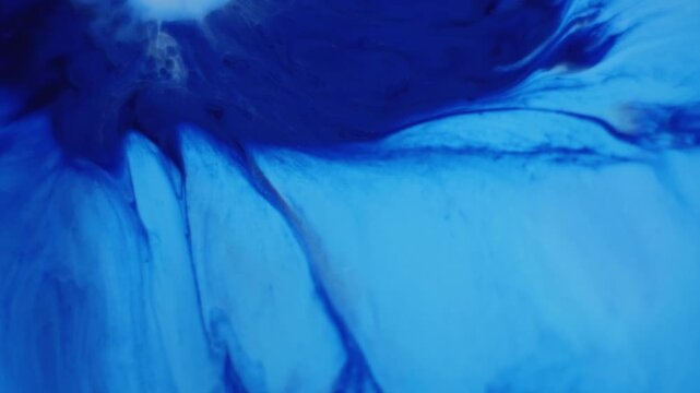 Paint mix. Hypnotic fluid. Blue liquid blotch blur stream swirl floating abstract emulsion background. Dye splatter spread color dripping.