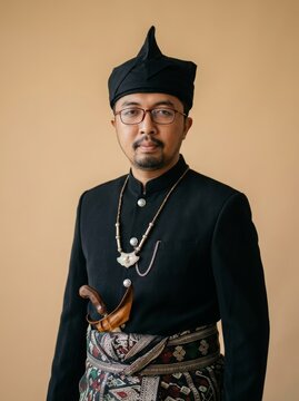 Bima man wearing RIMPU complete traditional Bima (Sumbawa) attire
