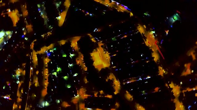 Circle speedy aerial view of Medellin by night. Colombia